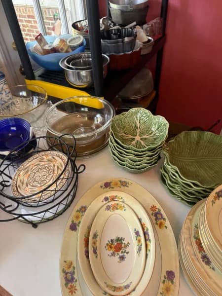 Vintage ceramic servingware lot with green leaf dishes and floral oval platters