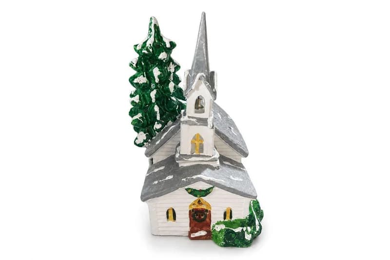 Painted Christmas village church figurine with steeple and evergreen tree