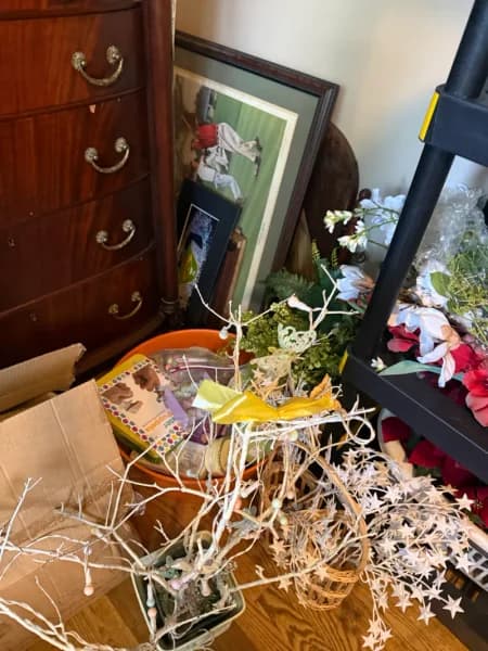 artificial floral arrangement in wicker basket