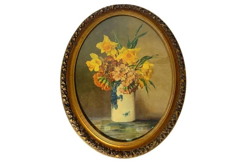 Framed oval floral still life painting