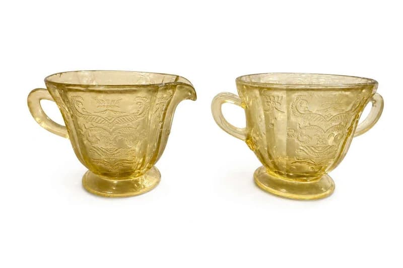 Amber pressed-glass handled creamer/pitcher pair