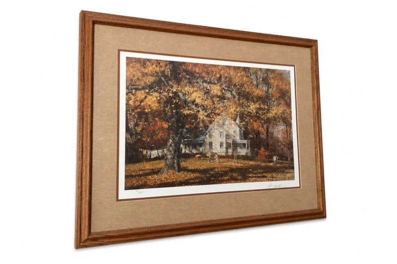 Framed autumn landscape print with rural house and large tree