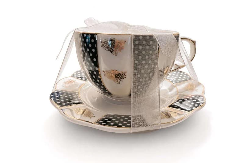Decorative polka dot butterfly teacup and saucer set
